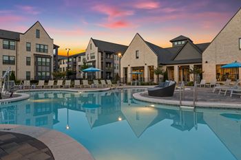 Resort-style pool with tanning ledges